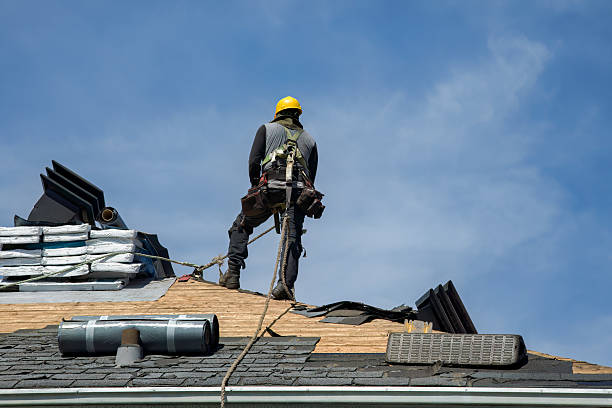 Professional Roof Replacement technician working in Montague, MI
